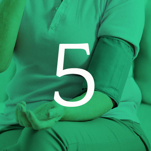 Blood pressure cuff on green background