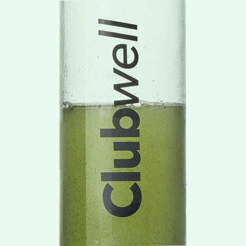 Green Clubwell bottle with Green5 mix on a light green background