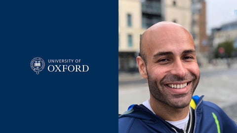 Ali Ibrahim smiling outdoors with the University of Oxford logo on a blue background
