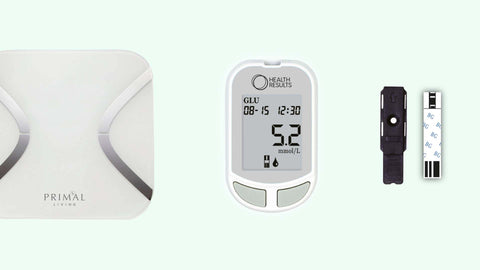 Glucose monitoring system with monitor and test strips on a light green background