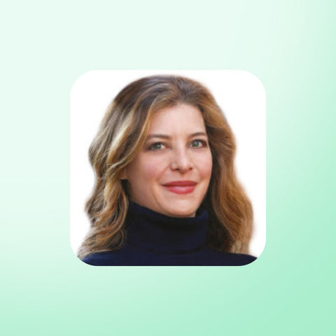 Nina Teicholz with wavy hair on a light green background