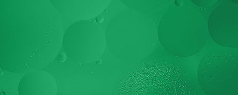 Green color swatch with water droplets