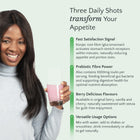 Woman holding a slimshotz pink drink with product features listed on the right