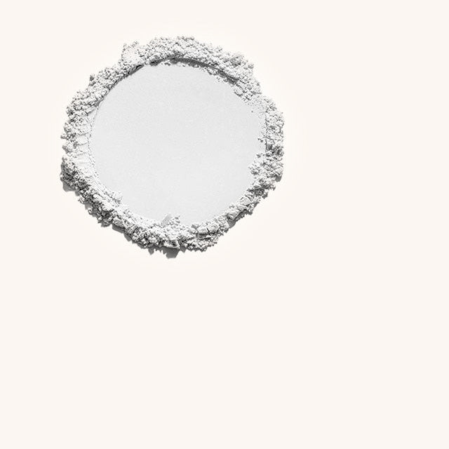 Round white powder on a white background